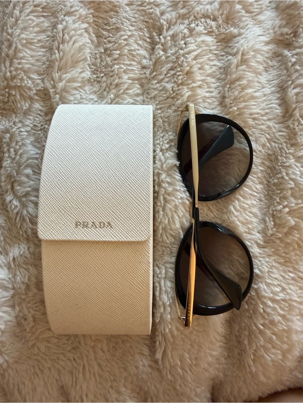 Prada Black Round Women's Sunglasses with Gold Accents